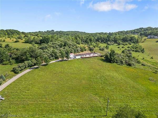 5.1 Acres of Land with Home for Sale in East Canton, Ohio