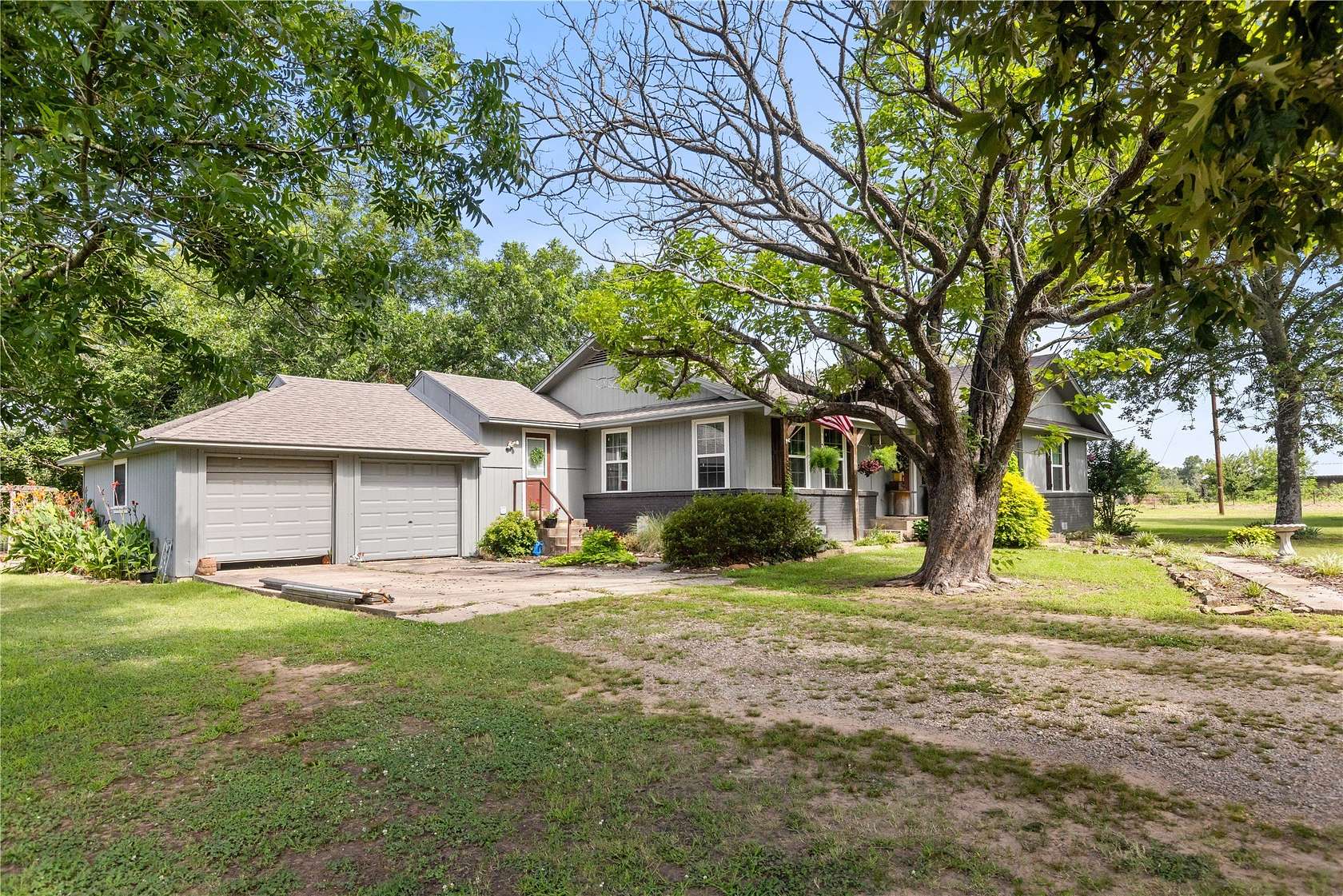 21 Acres of Land with Home for Sale in Blossom, Texas
