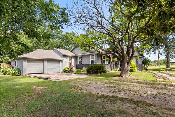 21 Acres of Land with Home for Sale in Blossom, Texas