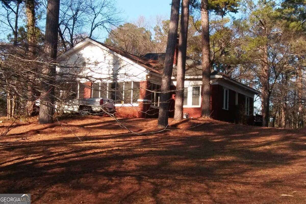 3.3 Acres of Land with Home for Sale in East Point, Georgia