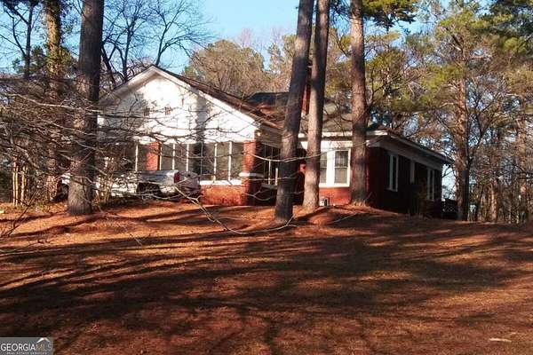 3.3 Acres of Land with Home for Sale in East Point, Georgia