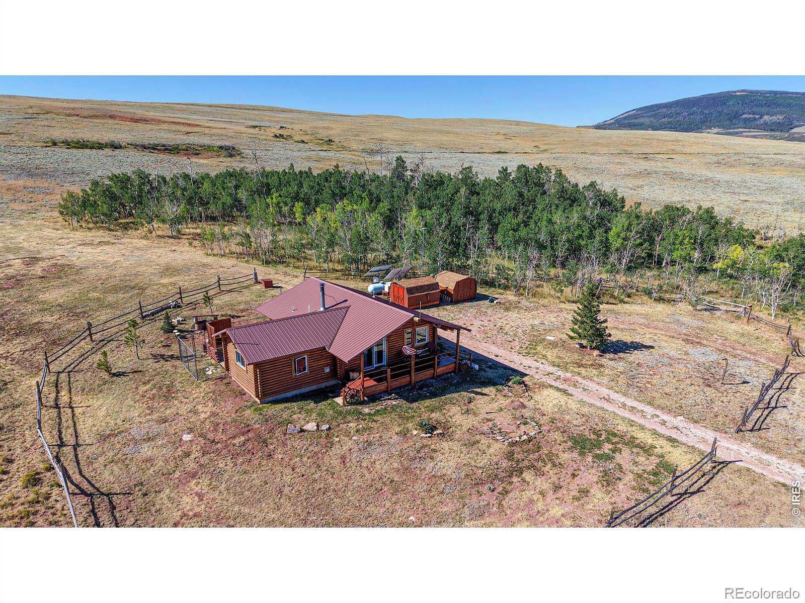 153 Acres of Land with Home for Sale in Red Feather Lakes, Colorado