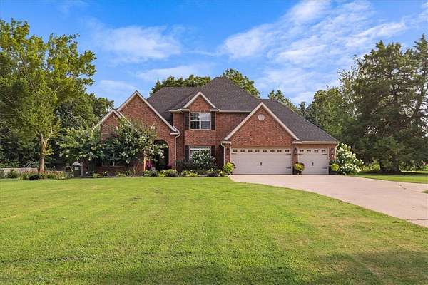 2 Acres of Land with Home for Sale in Gravette, Arkansas