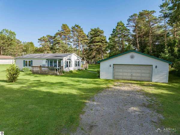 10 Acres of Land with Home for Sale in Alger, Michigan