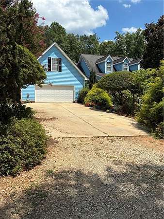 13.3 Acres of Land with Home for Sale in Loganville, Georgia