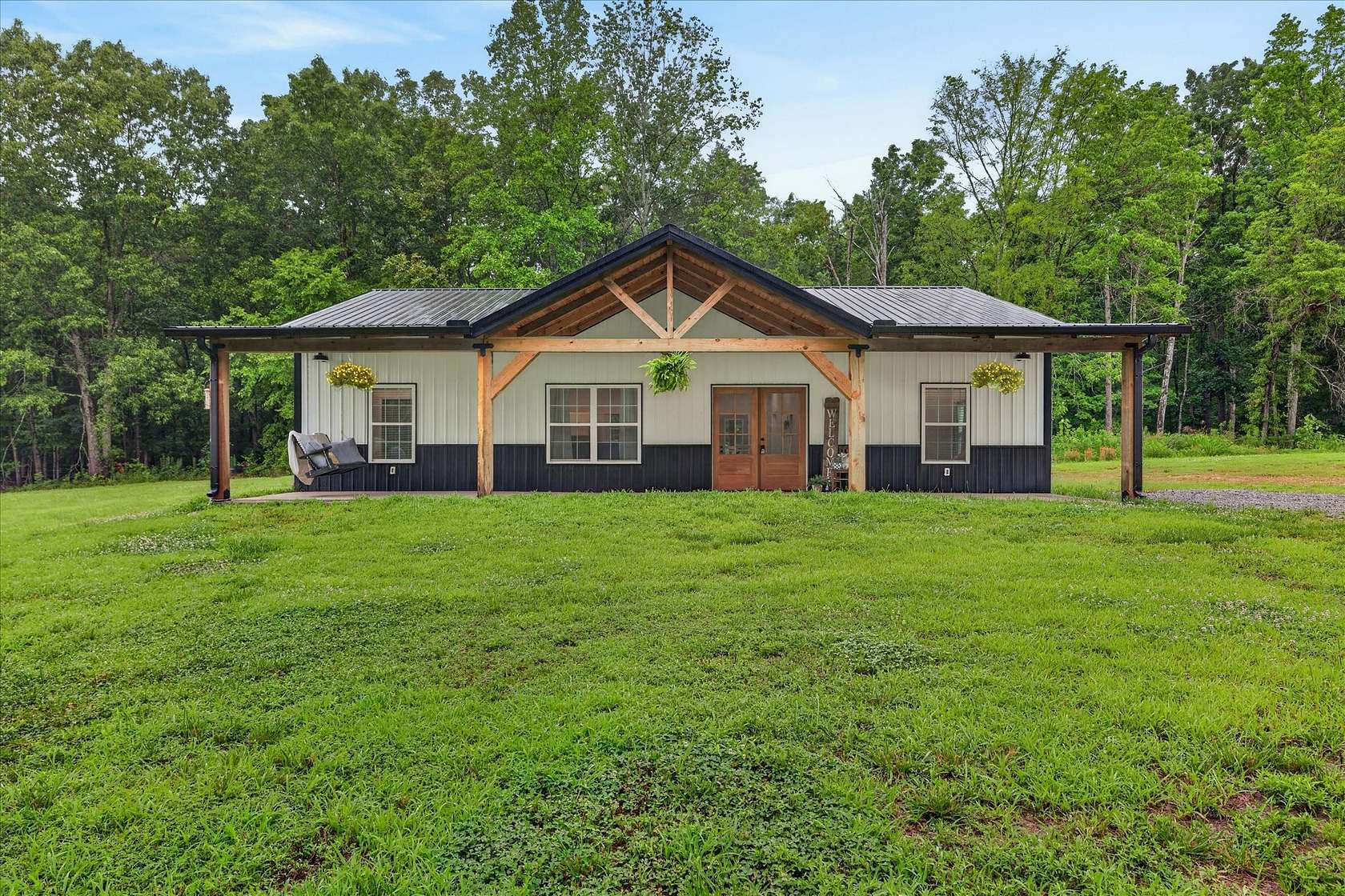 5.5 Acres of Land with Home for Sale in Indian Mound, Tennessee