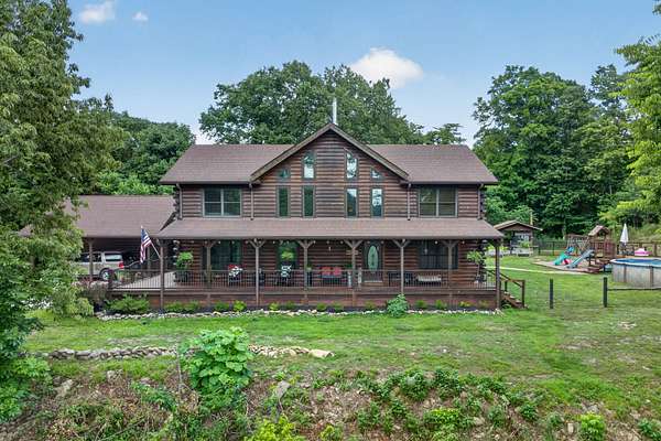 35.6 Acres of Recreational Land with Home for Sale in Elmwood, Tennessee