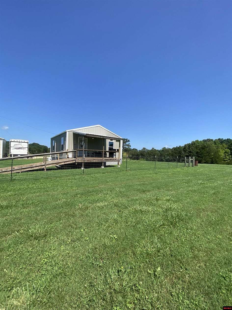 16.7 Acres of Land with Home for Sale in Marshall, Arkansas