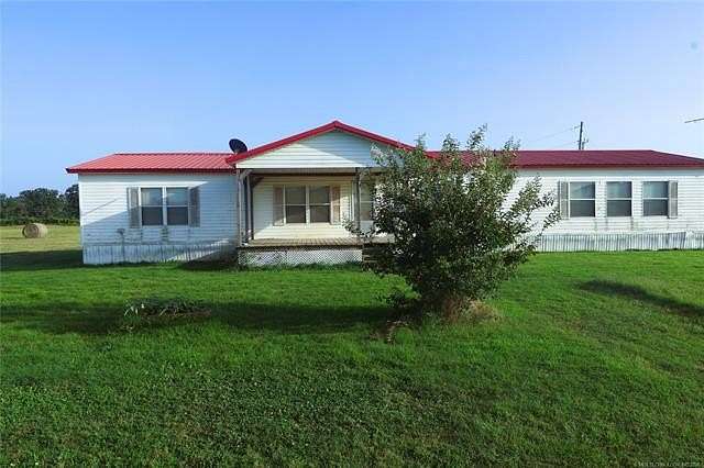 80 Acres of Agricultural Land with Home for Sale in McCurtain, Oklahoma