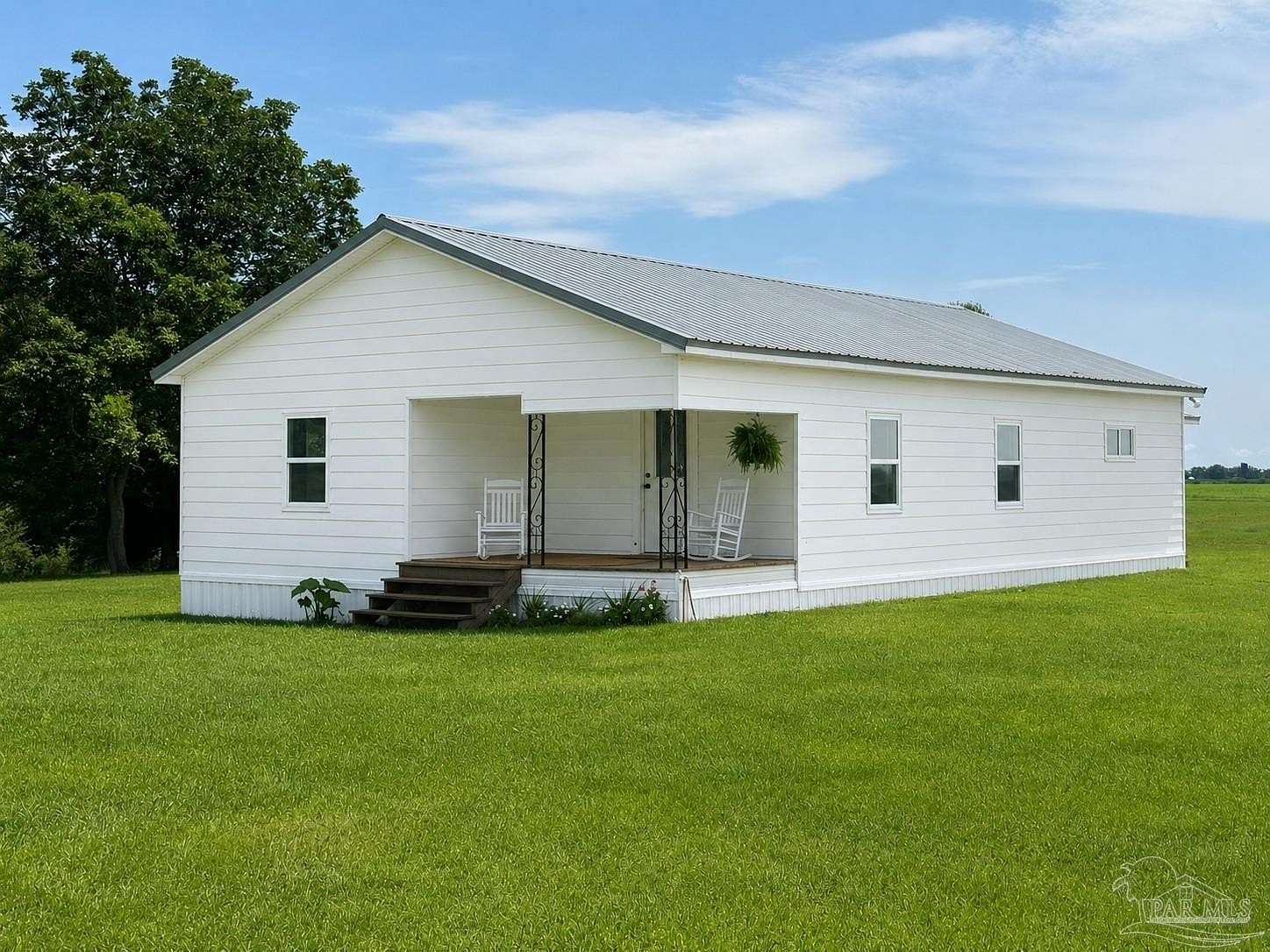 2.76 Acres of Land with Home for Sale in McDavid, Florida