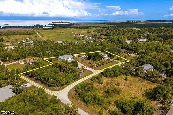 2 Acres of Land with Home for Sale in St. James City, Florida