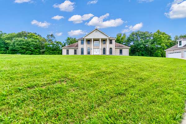 5.1 Acres of Land with Home for Sale in Cumberland Furnace, Tennessee