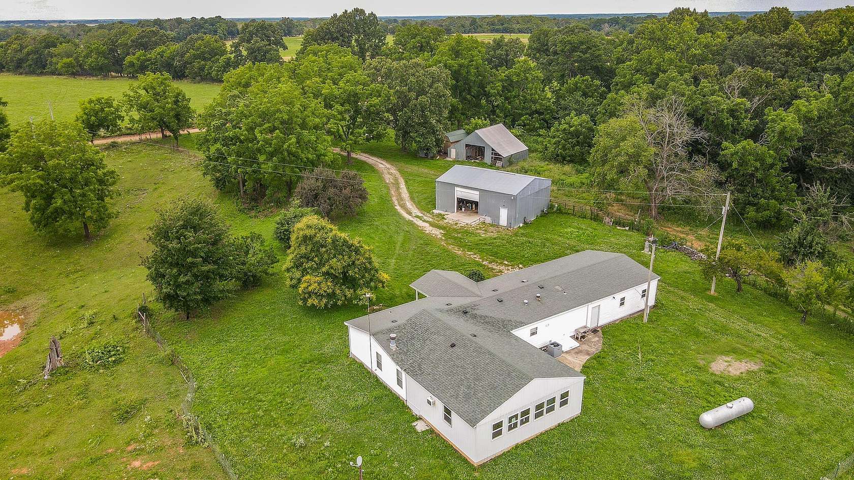 3 Acres of Land with Home for Sale in Rocky Comfort, Missouri