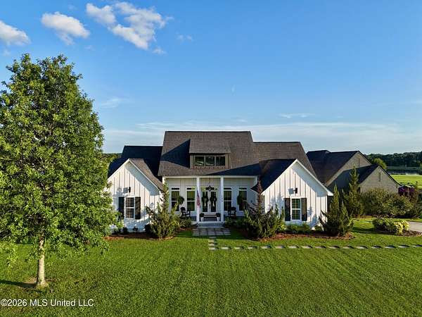 4.82 Acres of Land with Home for Sale in Madison, Mississippi