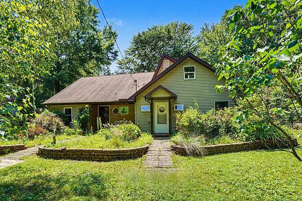 10.1 Acres of Recreational Land with Home for Sale in Grand Junction, Michigan