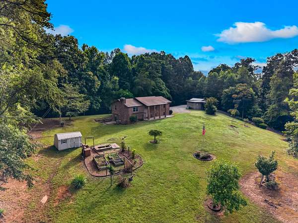 5 Acres of Land with Home for Sale in Surgoinsville, Tennessee