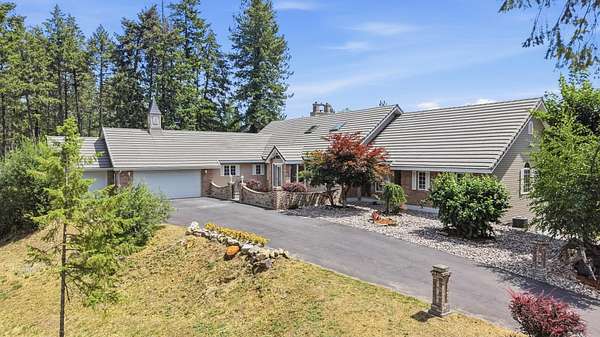 21.6 Acres of Land with Home for Sale in Colbert, Washington