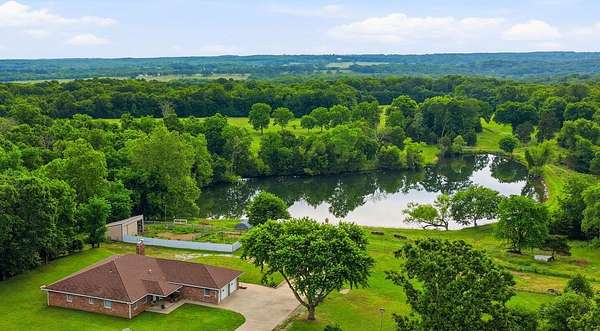 105 Acres of Recreational Land with Home for Sale in Bolivar, Missouri