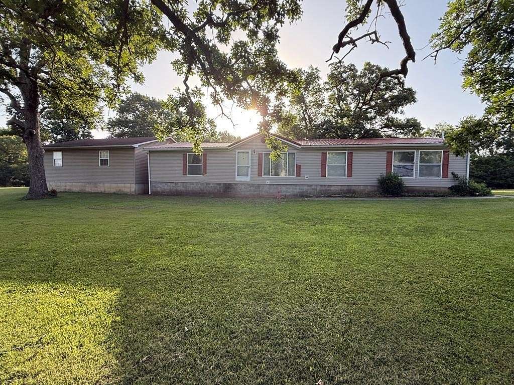 25 Acres of Recreational Land with Home for Sale in Moberly, Missouri