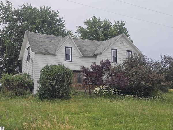 3 Acres of Land with Home for Sale in Weidman, Michigan