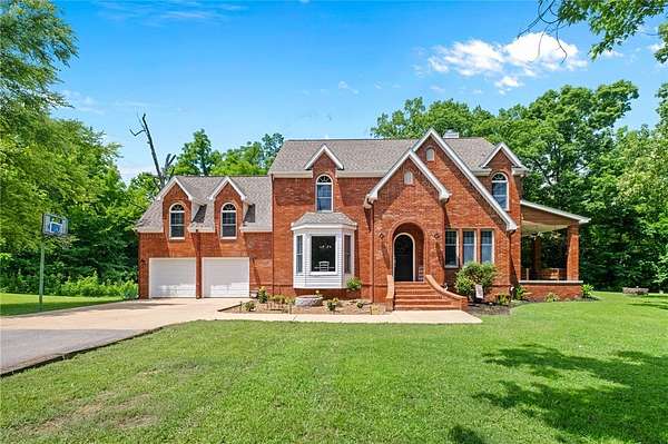 2.52 Acres of Land with Home for Sale in Gravette, Arkansas