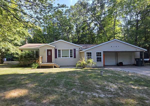 1.5 Acres of Land with Home for Sale in Whitehall, Michigan