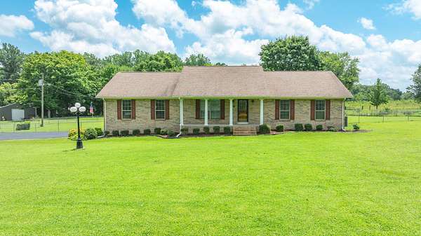 2 Acres of Land with Home for Sale in Loretto, Tennessee