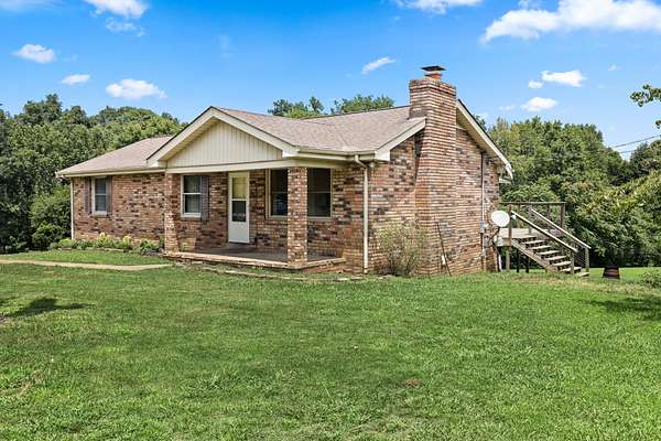 3.8 Acres of Land with Home for Auction in Joelton, Tennessee