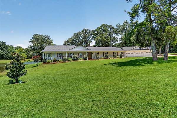 10.7 Acres of Land with Home for Sale in Paris, Texas