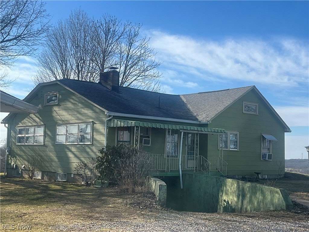 4.86 Acres of Land with Home for Sale in Marietta, Ohio