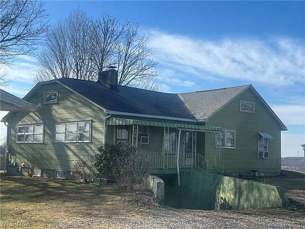 4.86 Acres of Land with Home for Sale in Marietta, Ohio