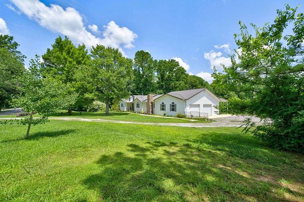 23.4 Acres of Agricultural Land with Home for Sale in Hilham, Tennessee