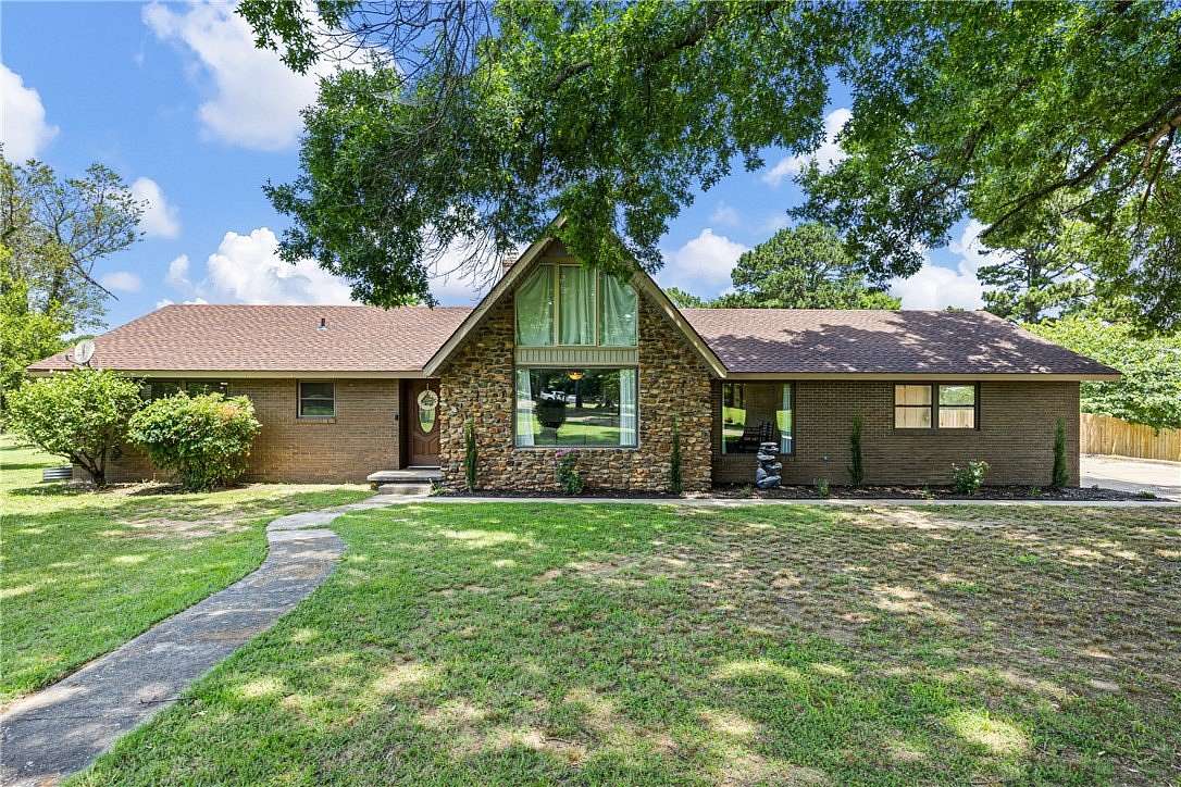 7 Acres of Land with Home for Sale in Clarksville, Arkansas