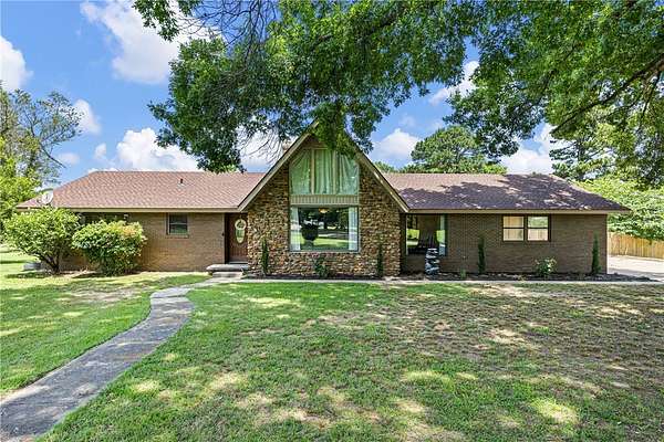 7 Acres of Land with Home for Sale in Clarksville, Arkansas