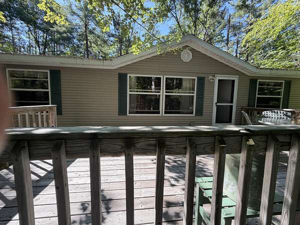 2 Acres of Land with Home for Sale in Vanderbilt, Michigan
