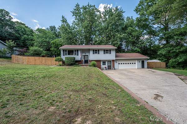 1.84 Acres of Land with Home for Sale in Fruitport, Michigan