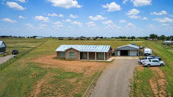 5 Acres of Land with Home for Sale in Lubbock, Texas
