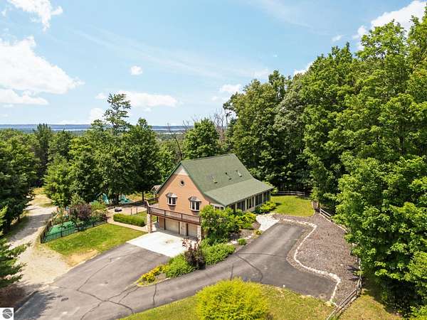 5 Acres of Land with Home for Sale in Williamsburg, Michigan