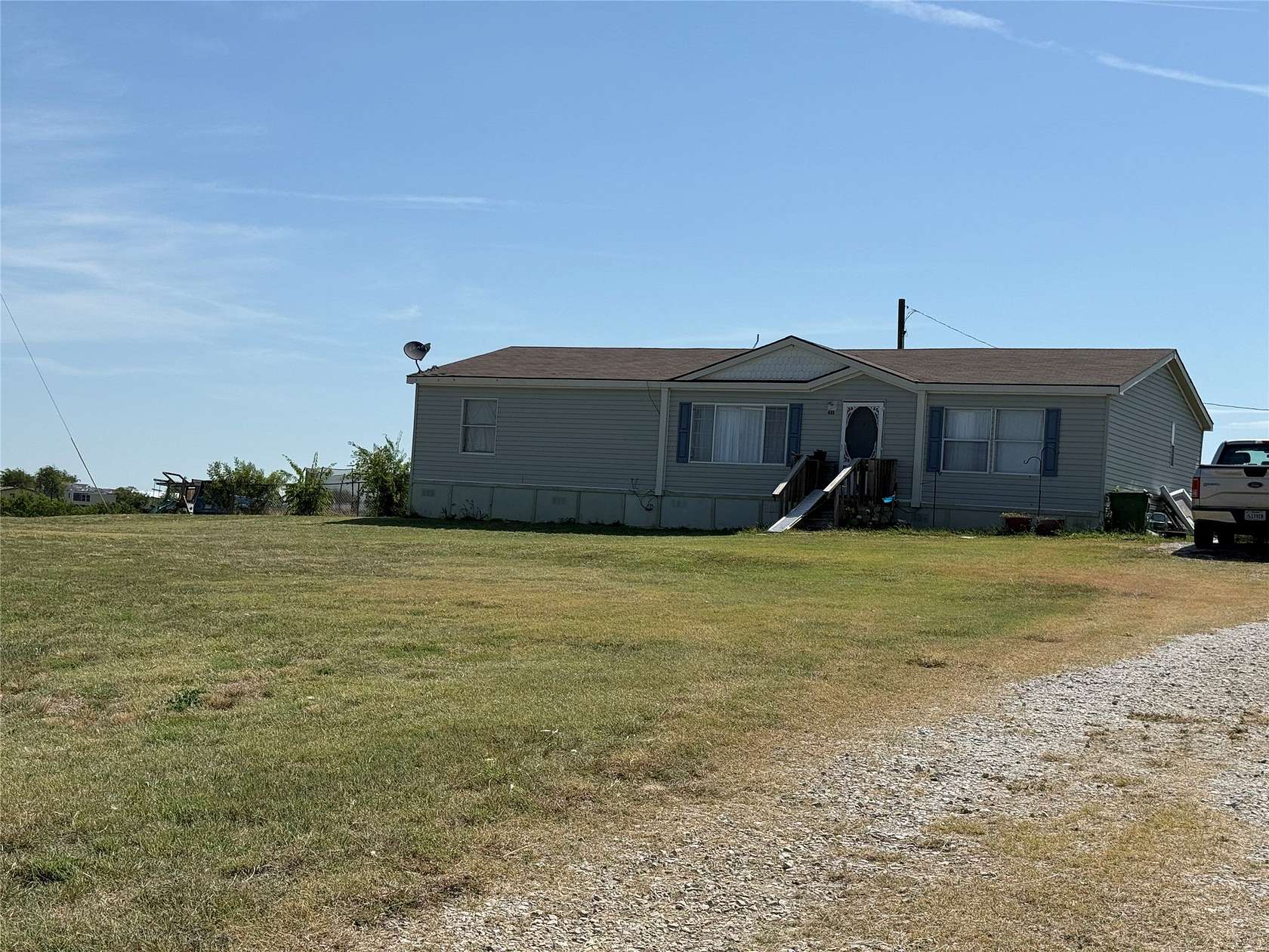 2 Acres of Land with Home for Sale in Rhome, Texas