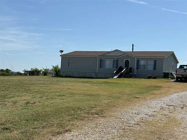 2 Acres of Land with Home for Sale in Rhome, Texas