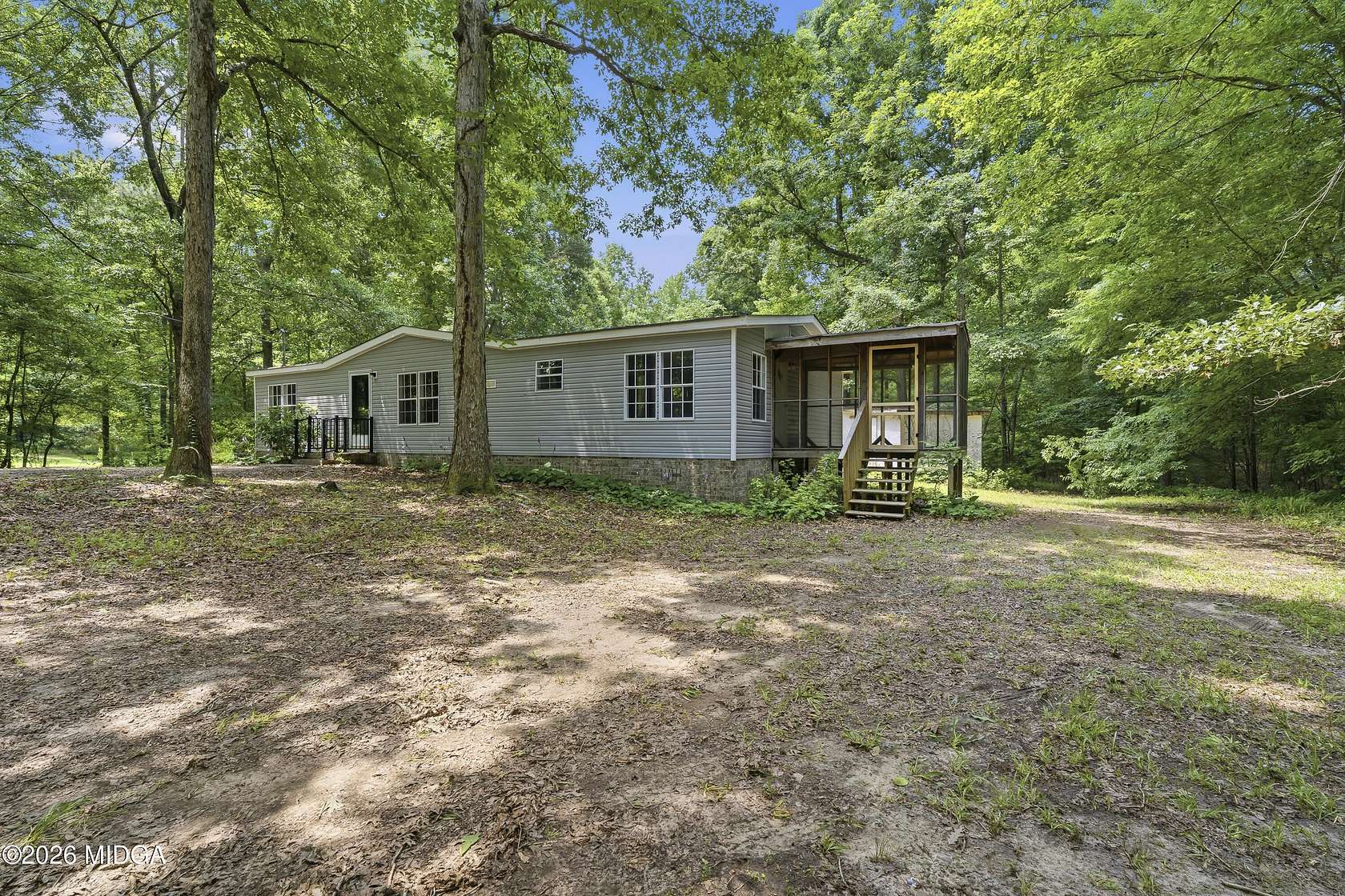 4.7 Acres of Land with Home for Sale in Forsyth, Georgia
