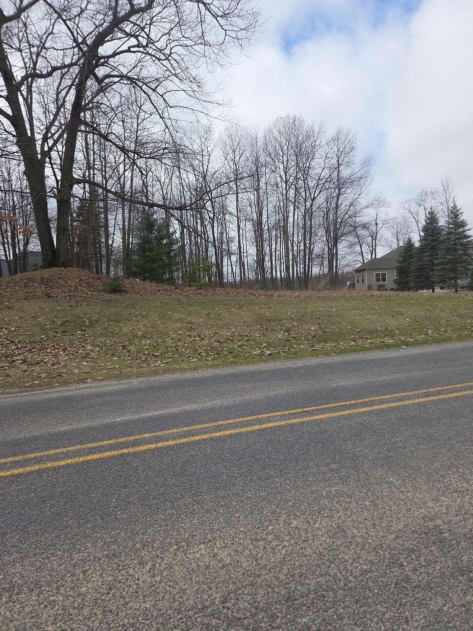 0.64 Acres of Land for Sale in Canadian Lakes, Michigan