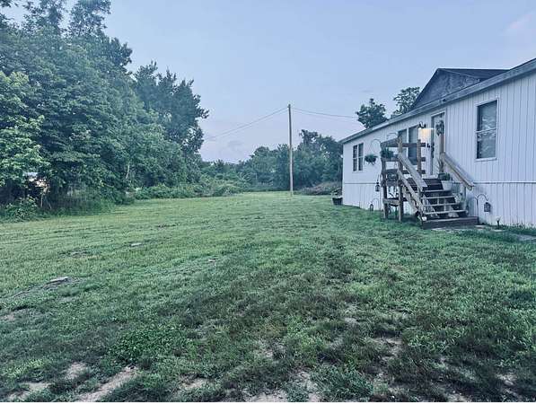 1.65 Acres of Land with Home for Sale in Covington, Tennessee