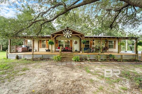 12.7 Acres of Land with Home for Sale in Robertsdale, Alabama