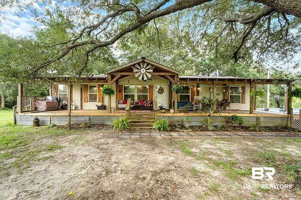 12.7 Acres of Land with Home for Sale in Robertsdale, Alabama