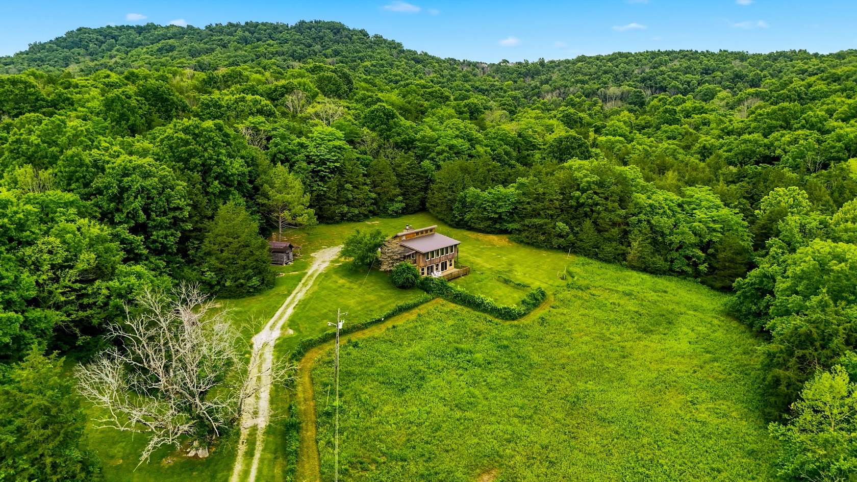 100 Acres of Recreational Land with Home for Sale in Watertown, Tennessee