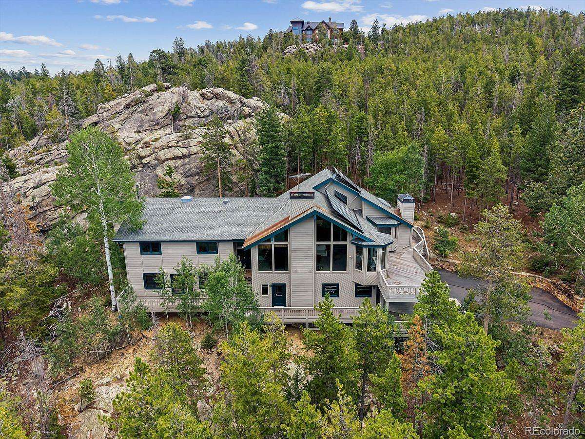 5.29 Acres of Land with Home for Sale in Evergreen, Colorado