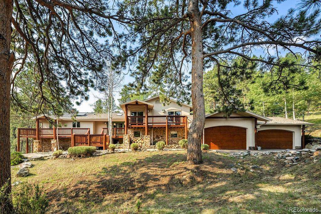 5 Acres of Land with Home for Sale in Evergreen, Colorado