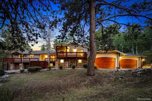 5 Acres of Land with Home for Sale in Evergreen, Colorado
