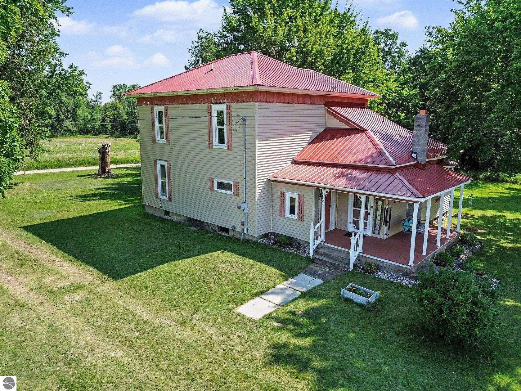 1.5 Acres of Land with Home for Sale in Shepherd, Michigan